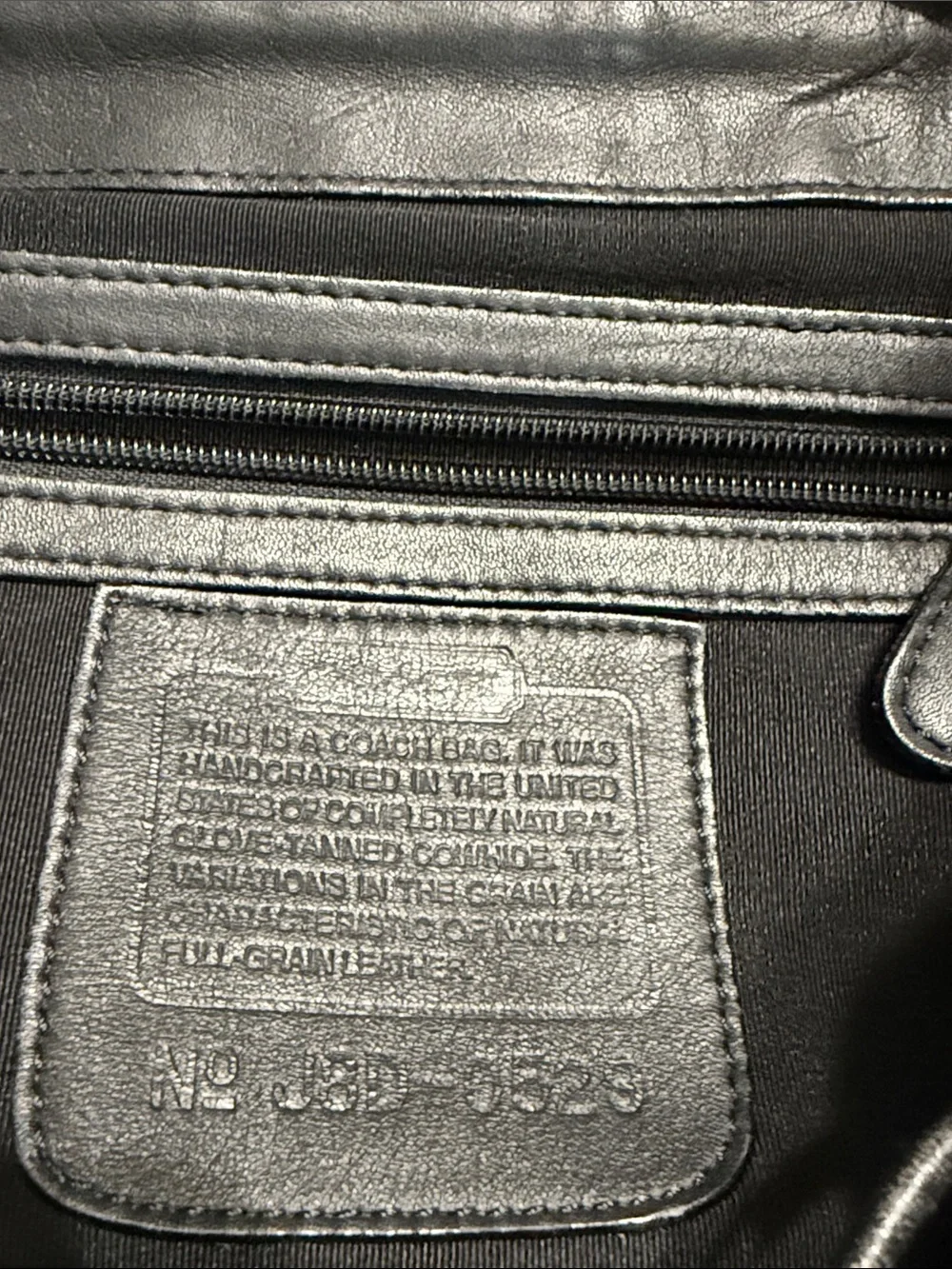 Coach Black Leather Backpack with Gold Buckle